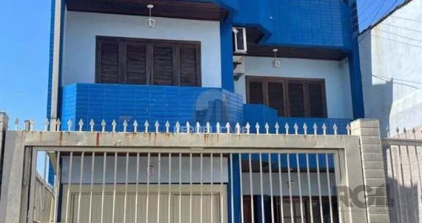 Casa 420m², 4 dormitórios, 3 vagas no bairro Partenon