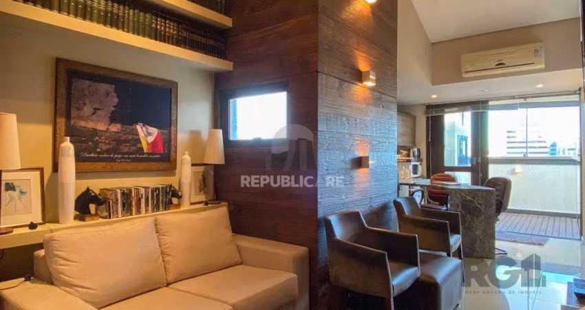 Sala mobiliada, com churrasqueira para happy hour e vista para o Guaíba