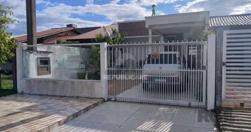 Casa de 2 dormitórios, com banheiro social, e um living em 2 ambientes, com banh