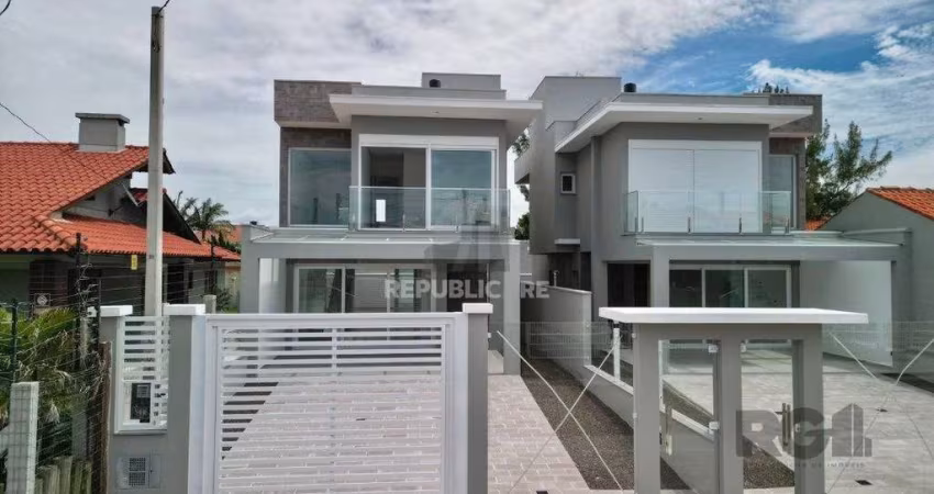 Casa 3 dormitórios à venda Zona Nova Capão da Canoa/RS
