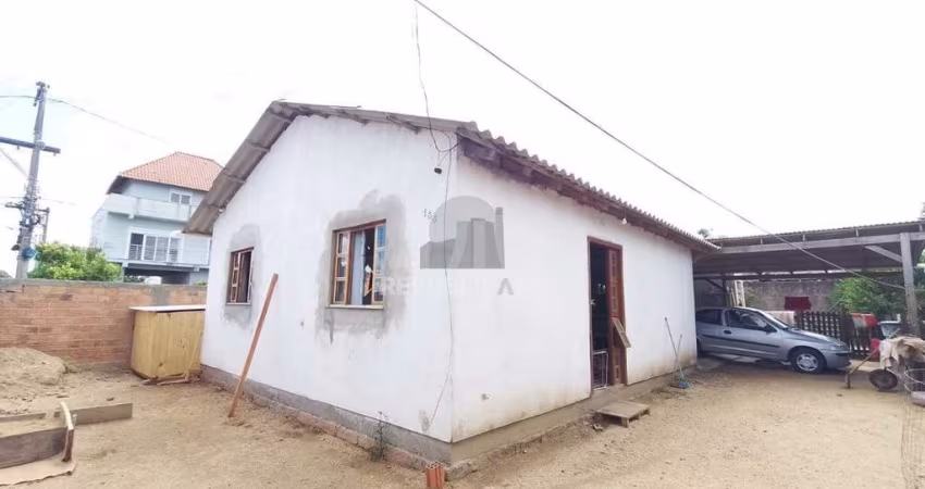 Casa 2 dormitórios à venda Guajuviras Canoas/RS