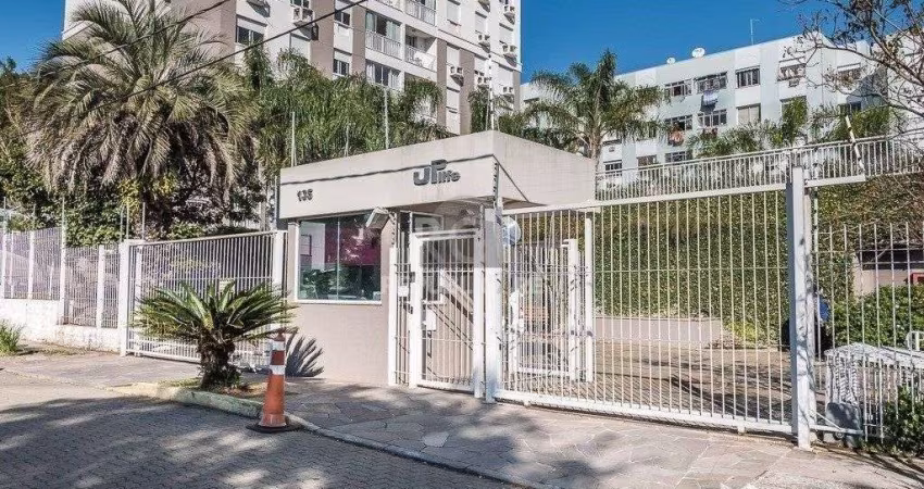 Apartamento de três dormitórios, suíte e uma vaga de garagem no bairro Cristo Re