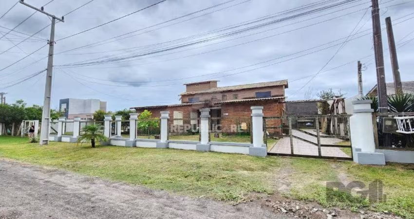 Casa 4 dormitórios à venda Capão Novo Capão da Canoa/RS