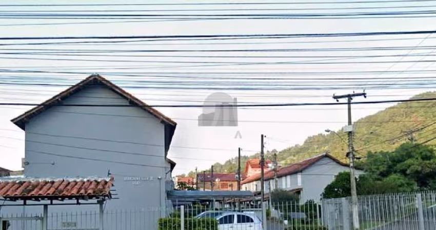 Sobrado 3 dormitórios condomínio Bouganville