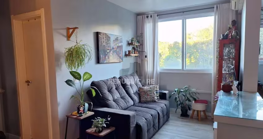 Apartamento de 2 quartos, cozinha planejada e 1 vaga escriturada.