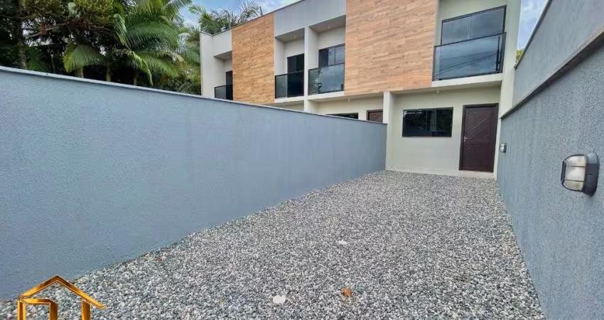 Sobrado geminado com 2 suítes e 2 vagas de garagem no bairro Rio Bonito