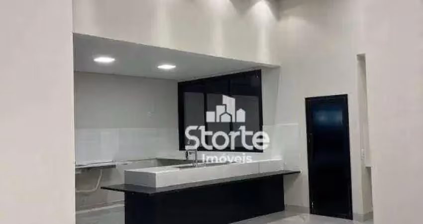 Casa com 3 dormitórios à venda, 168 m² por r$ 1.399.000,00 - condomínio raros alto umuarama - uberlândia/mg
