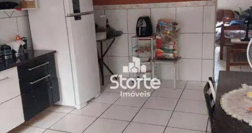 São duas casas em único terreno à venda, 110m² por r$ 390.000 - jardim brasília - uberlândia/mg