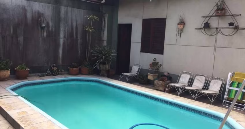 Casa com 4 quartos à venda na Avenida Guido Mondin, 424/430, São Geraldo, Porto Alegre