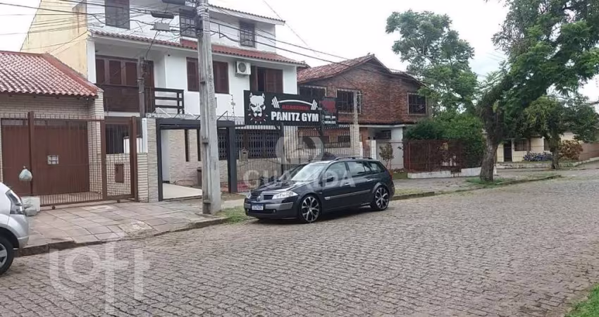 Casa com 3 quartos à venda na Rua Márcio Dias, 360, Nonoai, Porto Alegre