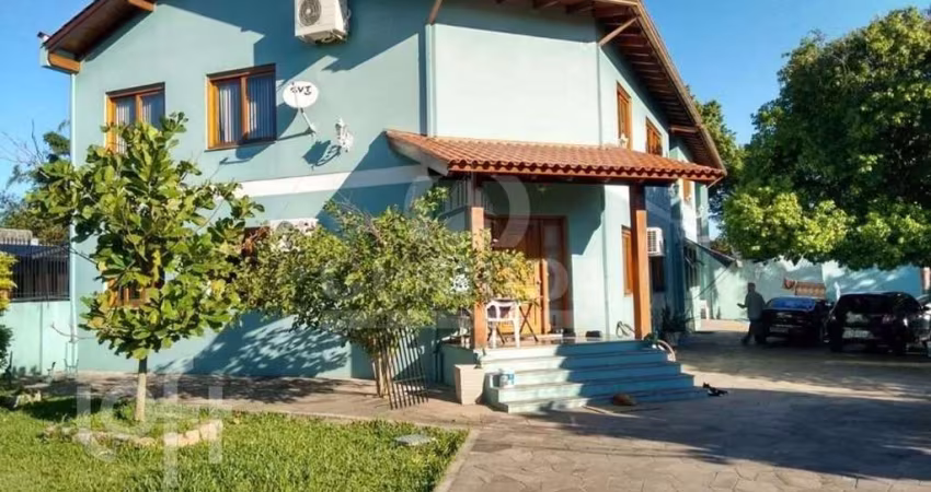 Casa com 3 quartos à venda na Travessa Alfredo Magalhães, 395, Ipanema, Porto Alegre