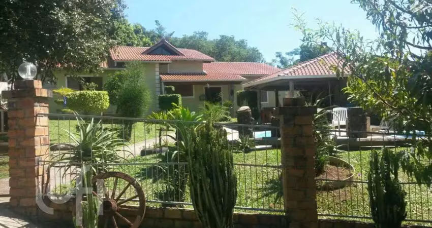 Casa com 4 quartos à venda na Olmiro Lametta Viegas, 6, Hípica, Porto Alegre