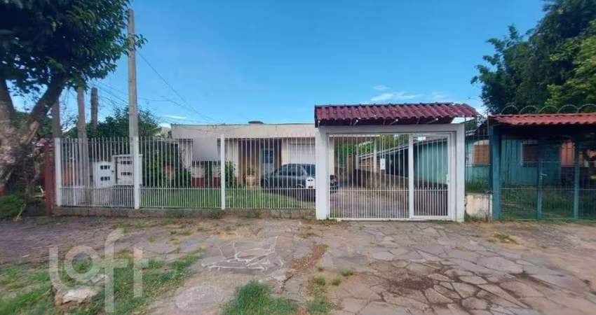Casa com 4 quartos à venda na Rua Marquês do Maricá, 524, Vila Nova, Porto Alegre