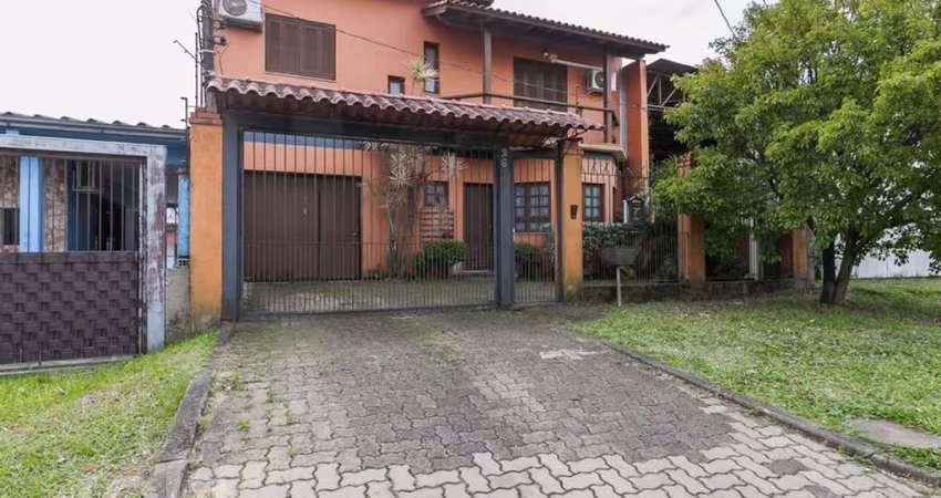 Casa com 3 quartos à venda na Rua Tomé Antônio de Souza, 267, Campo Novo, Porto Alegre