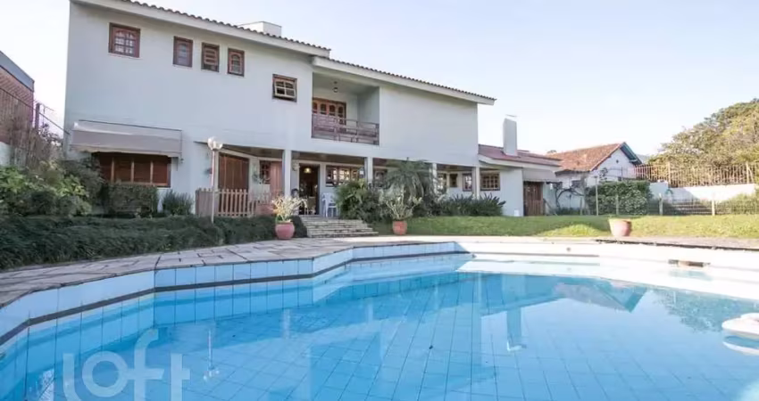 Casa com 5 quartos à venda na Rua Caiapó, 15, Vila Assunção, Porto Alegre