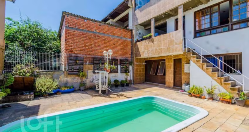 Casa com 3 quartos à venda na Rua Vinte e Seis de Dezembro, 648, São José, Porto Alegre