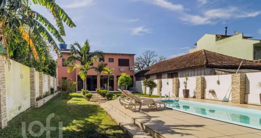 Casa com 3 quartos à venda na Rua Humberto de Campos, 1267, Partenon, Porto Alegre