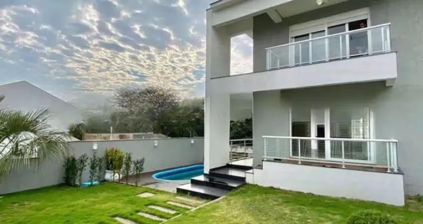 Casa com 5 quartos à venda na Rua Claudio da Silva Pinto, 658, Hípica, Porto Alegre