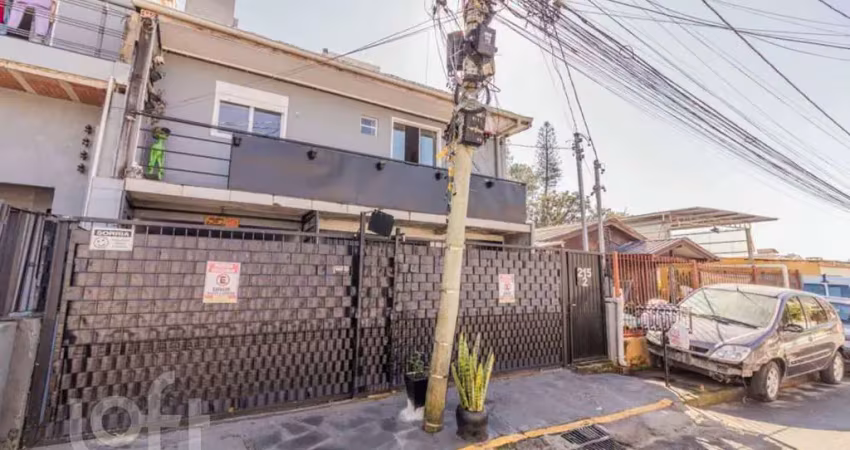 Casa com 3 quartos à venda na Travessa Escobar, 215, Camaquã, Porto Alegre