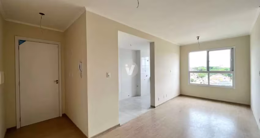 Apartamento de 2 dormitórios e com vaga de garagem.