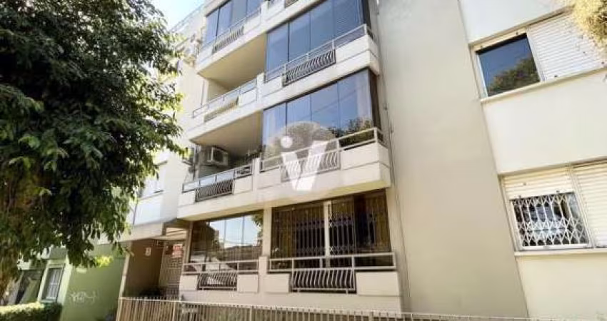 Apartamento de dois dormitórios com vaga de garagem, na região central.