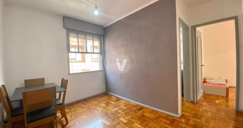 Apartamento central 2 dormitórios com vaga de garagem