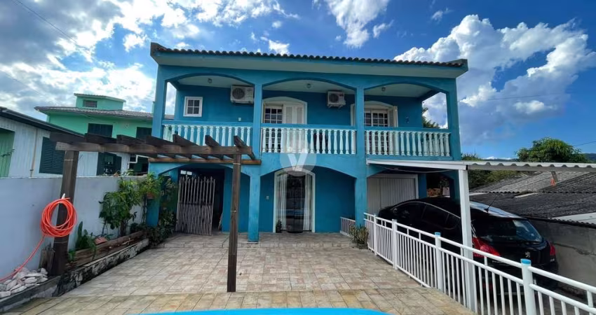 Casa com piscina na Salgado filho