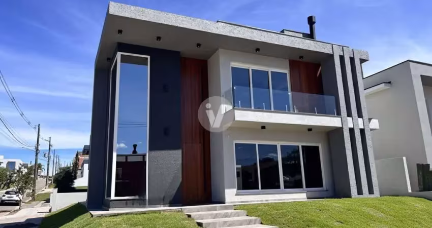 Casa com 229 m², pátio e 2 vagas de garagem em condomínio fechado em camobi