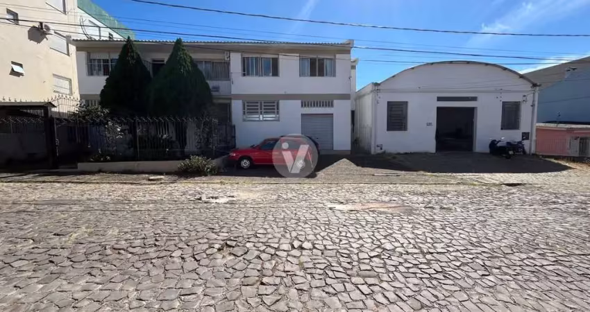Casa comercial excelente localização com loja e pavilhão