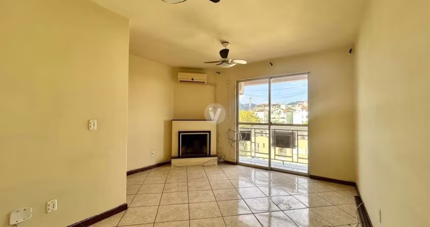 Apartamento de dois dormitórios sendo um suíte no centro de Santa Maria.