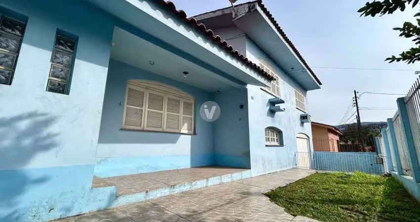 Casa ampla com 3 dormitórios, localizada no bairro rosário