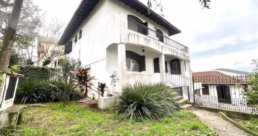 Casa para locação com 4 dormitórios, localizada no bairro nonoai