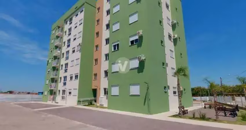 Apartamento de dois dormitórios, sacada e vaga de estacionamento, localizado no
