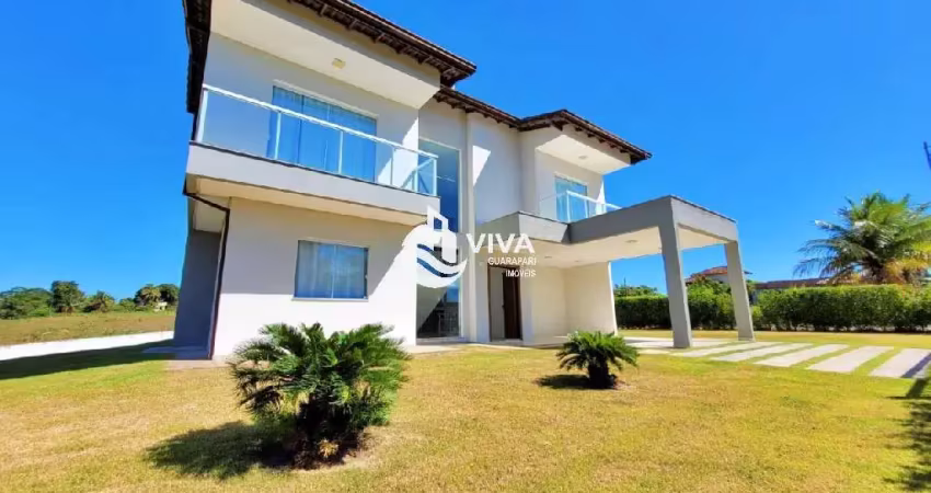 Casa duplex em condomínio composto por 5 suítes com área de lazer á venda no bairro lameirão, guarapari-es  - realize negócios imobiliários.