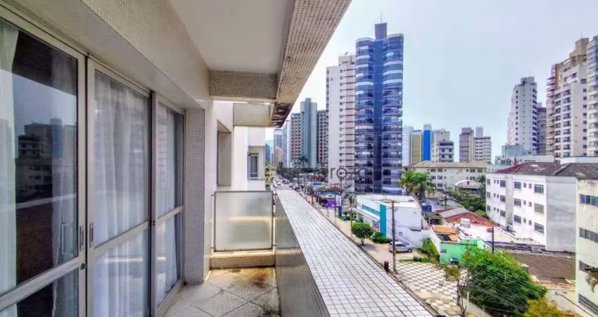 Apartamento a venda na praia das astúrias, 02 dormitórios, com sacada e 01 vaga de garagem