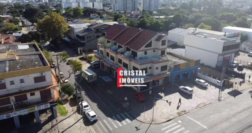 Prédio comercial com 7 lojas e 13 salas comerciais a venda no Bairro Camaquã - A21756