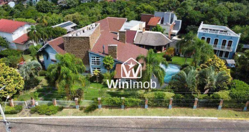 Casa com 5 dormitórios à venda, 450 m² por R$ 3.850.000,00 - Condomínio Cantegril - Viamão/RS