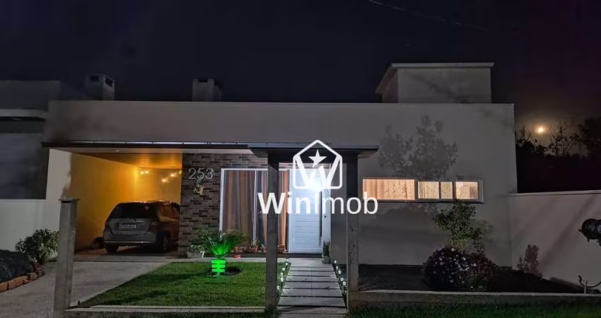Casa com 3 dormitórios à venda, 138 m² por R$ 699.000,00 - Condomínio Cantegril - Viamão/RS