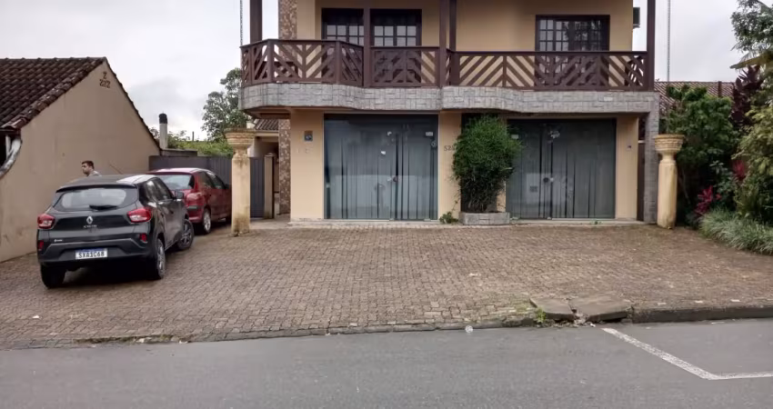 Sobrado residencial e c/ 2 salas comerciais - aceita chácara como permuta