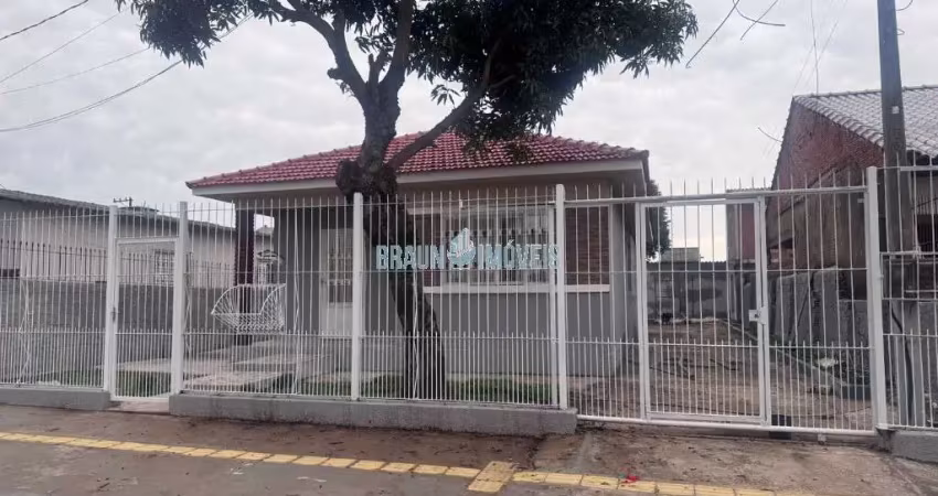 Casa de 3 dormitórios sendo 1 suite em cachoeirinha em excelente localização na parada 56 com 12 metros de frente.