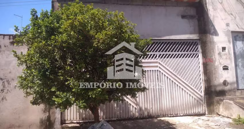 Vende-se uma casa .