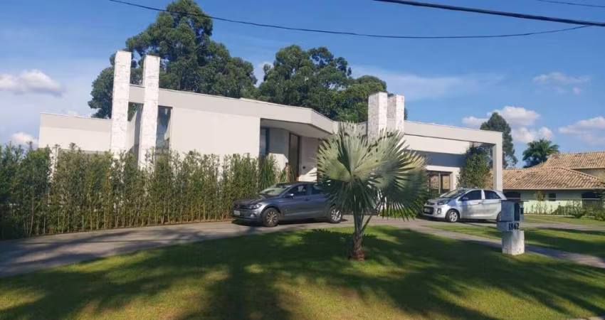 CASA  térrea localizado no Alphaville 1 / 4 suítes / ótima localização