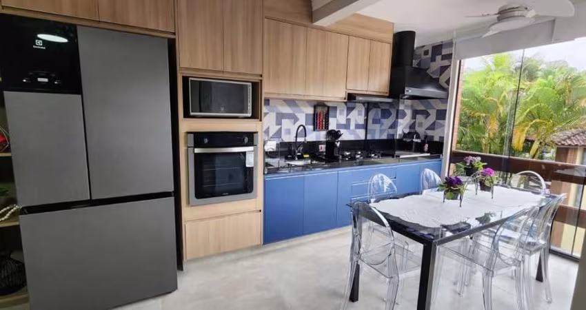 Flat com 2 dormitórios à venda, 68 m² por R$ 990.000,00 - Riviera - Módulo 26 - Bertioga/SP