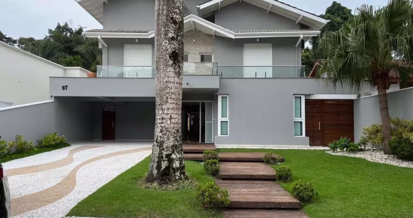 Casa com 6 dormitórios à venda, 470 m² por R$ 5.700.000,00 - Riviera Módulo 20 - Bertioga/SP