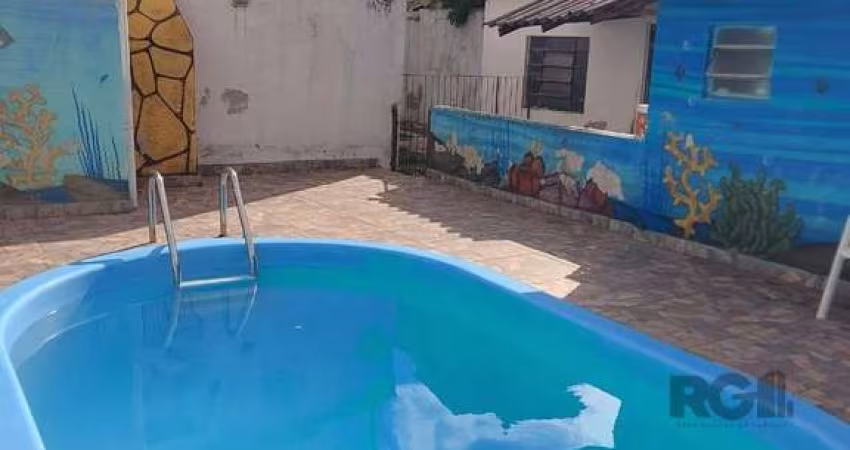 Casa com 4 quartos, suíte, vagas de garagem, piscina, hidromassagem, lareira, no bairro Aberta dos Morros, Porto Alegre/RS&lt;BR&gt;&lt;BR&gt;Casa ampla e bem planejada, ideal para famílias que buscam