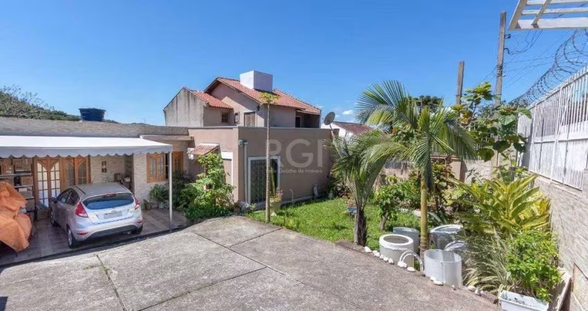 Casa para Venda - 370m², 4 dormitórios, sendo 1 suites, 6 vagas - Lomba do Pinheiro
