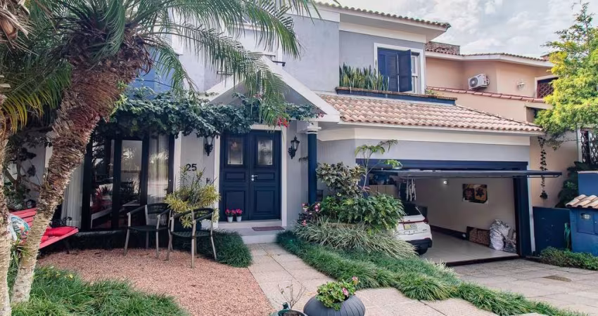 CASA DE 4 DORMITÓRIOS EM CONDOMÍNIO - 320 m² - 4 VAGAS DE GARAGEM