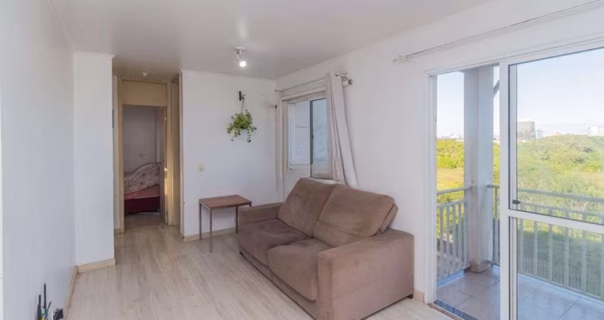 Apartamento com 2 dormitórios e 1 vaga de garagem no Bairro Humaitá