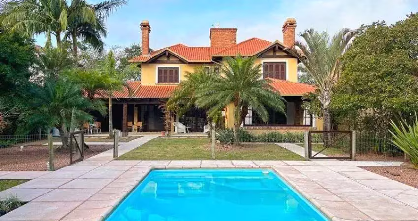 Terra ville - casa com 384 m² - fundo para o lago , semi mobiliada , com 3 suites e piscina .