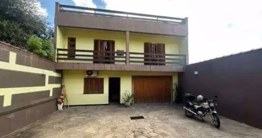 Ótima casa no bairro jardim lindóia, com 4 quartos, pátio amplo e área com churrasqueira